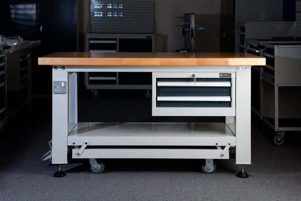 Pedal-Lift Workbench with Retractable Foot-Pedal Casters
